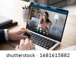 Small photo of Close up of businessman talk with female business partner or client using video call on laptop, male employee talk consult with coach on webcam conference on computer, online consultation concept