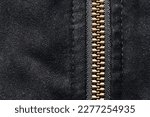 Small photo of Plastic zipper background. Dark black coat zipper. Empty copy space fabric texture. Closeup zipper teeth. Metal shiny clothing part. Closeup zipped zipper.