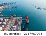 Small photo of Evening at the oil refinery of business logistic sea going ship, Crude oil tanker lpg ngv at night Group Oil tanker ship to Port of Singapore-Cargo ship import export. international order concept.