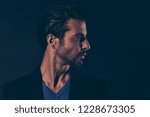 Small photo of Close-up profile side view portrait of nice well-groomed self-content tired handsome attractive classy luxury chic man in blazer suit isolated over dark black background