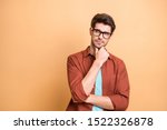 Close-up portrait of his he nice attractive serious focused minded brown-haired guy experienced professional financier economist thinking touching chin isolated over beige color pastel background