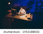 Small photo of Nice attractive stylish lonely single lady top executive manager marketer financier analyzing startup financial result preparing daily report at night dark industrial interior style work place station