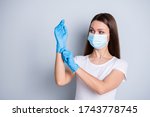 Small photo of Photo of citizen responsible lady keep social distance crowd people hospital examination put on gloves hundred per cent protection concept wear face mask isolated grey color background