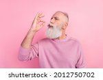 Profile photo of funny grey beard old man taste food wear pink sweater isolated on pastel color background