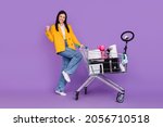 Full size photo of stylish business lady model win sale home appliance lucky blogger isolated on violet color background