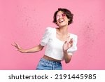 Photo of sweet shiny lady wear white blouse heart glasses dancing empty space isolated pink color background