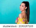 Profile photo of optimistic millennial tail hairstyle lady near promo wear floral top isolated on turquoise color background