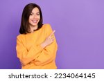 Close up photo of pretty cheerful lady stylish orange clothes arm direct empty space beauty procedure isolated on purple color background