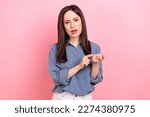 Small photo of Photo of unhappy unsatisfied offended lady wear stylish clothes bends fingers say pretense isolated on pink color background