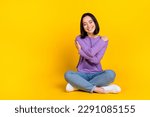 Small photo of Full size photo of optimistic girl bob hairdo dressed violet shirt pants embrace herself eyes closed isolated on yellow color background