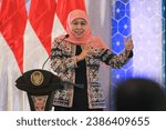 Small photo of Surabaya, Indonesia - November 10th, 2023: East Java Governor Dr. Dra. Hj. Khofifah Indar Parawansa, M.Si. during a speech at a government event.