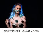 Small photo of A woman with blue hair and a fake moustache. A Woman with Blue Hair and a Fake Moustache