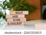 Wooden blocks with words 'What Are Your Hobbies?'.