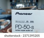 Small photo of Hamburg, Germany - Jul 24, 2023: During the unboxing process, a Pioneer PD-50-S Super Audio CD player is revealed, boasting DSD support along with iPhone, iPad, and iPod compatibility.