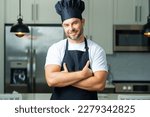 Small photo of Man chef cooker baker. Millennial male chef in chefs uniform. Chef man cooking on kitchen. Chef cook in hat and apron.