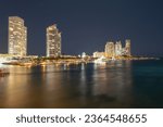 Small photo of Night panoramic photo of Miami landscape. Miami Downtown behind MacArthur Causeway shot from Venetian Causeway.
