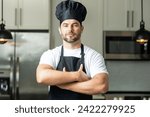 Small photo of Portrait of chef man in a chef cap in the kitchen. Man wearing apron and chefs uniform and chefs hat. Character kitchener, chef for advertising.
