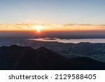 Sunset over Lake Chiemsee from the summit of Mount Hochfelln.
