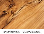 Slab, saw cut wood treated with varnish close-up on a black background. Isolate. Luxury wood for countertops and tables.. Design materials, stylish details for presentation and shop. Concept.