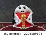 Small photo of Doha, Qatar - September 23, 2022: The official Mascot of the FIFA World Cup 2022 Qatar, La'eeb. La'eeb is an Arabic word meaning “Super-skilled player”