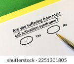A person is answering question about illness. She is suffering from mast cell activation syndrome.