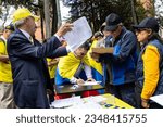 Small photo of BOGOTA, COLOMBIA - 16 August 2023. People signing for the Cabildo Abierto. Marche asking for Gustavo Petro impeachment.