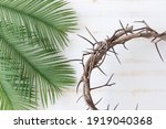 wood crown of thorns and palm leaves