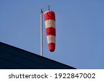Red And White Striped Windsock...
