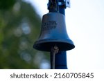 Small photo of Close-up of bell of ferry named Vogel Gryff at City of Basel on a sunny spring day