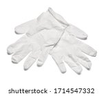 close up of white latex protective gloves on white background