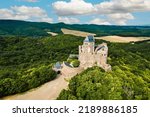 Aerial view of medieval ruined Holloko castle, UNESCO world heritage site in Hungary. Historical castle in Hungary Mountains
