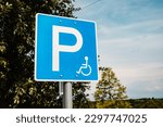 Blue Parking sign for cars on the road. handicapped parking spot