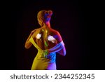 Tender lady with digital neon filter lights on body over dark mode background. Model in white dress. Concept of digital art, fashion, cyberpunk, futurism and creativity, beauty, ad
