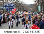 Small photo of Mainz, Germany - February 10, 2024: Traditionally, every year at 14.11 at the carnival season is opened in Mainz by shouting 3x "Helau" and celebrating on the streets with kids, Der Jugendmaskenzug.