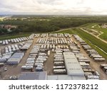 Small photo of Aerial view new, pre-owned and consigned recreational vehicle at RV dealership, consignment parking lots in Houston, Texas, USA