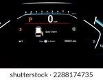 Right sliding rear door open warning on instrument panel or dashboard control of modern minivan car, low milage only 23 miles glowing illuminated LED indicator display.  Driving safely assistant tech