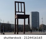 Small photo of Geneva, Switzerland - 3 12 2015: Chair monument in front of United Nations building in Geneva - dedicated to all victims of landmines