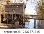 Small photo of beautiful old grist mill on the lake