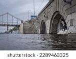 Small photo of «Kyiv, Kyiv region Ukraine – 04.15.2023: Due to a large amount of rain, the water in the Dnieper River has risen significantly, and the central embankment of Kyiv is heavily flooded.».
