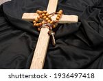 Close Up Of A Wooden Cross Lies ...