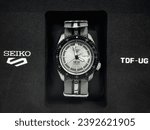 Small photo of Selangor, Malaysia - 24 Nov 2023: Seiko 5 TDF-UG, a limited edition watch, marking the 55th anniversary of Ultraseven. Specially designed with Ultra Guard’s Terrestrial Defense Force logo and color.