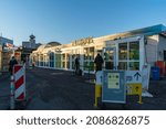 Small photo of Berlin 2021: The Flixbus store at the ZOB (Zentraler Omnibus Bahnhof) Berlin. The company is a global mobility provider and operates Europe's largest long-distance bus network.
