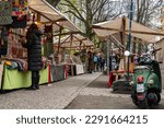 Small photo of Berlin Neukolln 2023: The weekly market on Maybachufer offers fresh fruit and vegetables, fish, cheese, street food from many countries, flowers and stalls with fabrics and bric-a-brac.