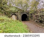 Small photo of The old railway tunnels in Waterfoot at the Glen. Once on the line between Rawtenstall and Bacup, one is now sealed up and the other a popular bike route.
