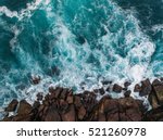 Aerial View Of Ocean Waves And...