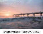 Sunrise With A View Of The Pier