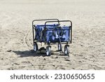 A carry wagon placed on the beach.
