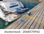 Small photo of Paphos, Cyprus, 01.11.2021. The yacht is moored astern in the harbor of Paphos