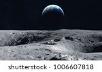 Moon Surface And Earth On The...