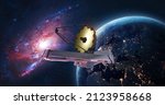Small photo of JWST in space near Earth. James Webb telescope far galaxies and planets explore. Sci-fi space collage. Astronomy science. Elements of this image furnished by NASA